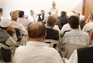 NC general secretary Ali Mohd Sagar addressing party meeting at Srinagar on Wednesday.