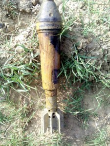 A live mortar shell found near railway track at Nanke Chak in Samba on Monday.  -Excelsior/Gautam
