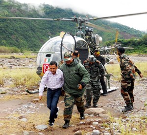 A villager trapped in Ujh river being rescued by Army using helicopter in Billawar area of Kathua.