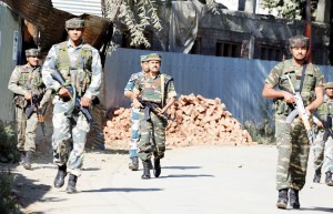Troops in action during encounter at Ladoora, Rafiabad on Wednesday. —Excelsior/Aabid Nabi