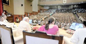 Prime Minister Narendra Modi interacting with school children through video conferencing, on eve of the Teacher's Day at Manekshaw Centre, in New Delhi on Friday. (UNI)