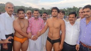 Wrestlers being felicitated by Joint Secretary J&K State Sports Council, Shiv Kumar Sharma on Monday.
