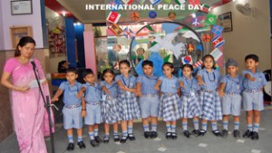 Headmistress Sofia Rana addressing kids while celebrating International Peace Day at KC Public School in Jammu.