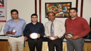 Officials of Eon Electric Ltd showcasing products during a dealers’ meet at Jammu.