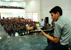 Student performing during Instrumental Competition at Heritage Public School in Jammu.