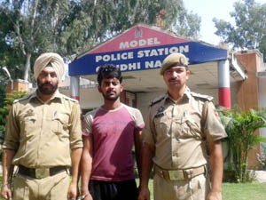 Murder accused in police custody.