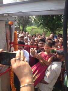 MLC Surinder Ambardar inaugurating newly installed transformer at Tomal Bohri.