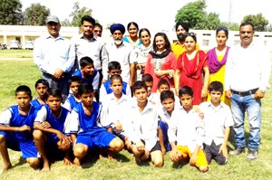 Players posing for a group photograph along with officers and officials at BHS Simbal Camp on Friday.