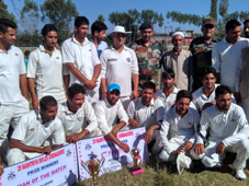 Jubilant players of Palhallan A team posing for a group photograph alongwith dignitaries on Wednesday.