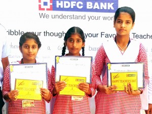 Winnerrs of Painting Competition organized by HDFC Bank posing for a photograph at Harsh Niketan Hr Sec School in Sunderbani.