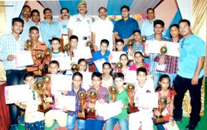 Winners posing for a group photograph during felicitation function organized by JK Complete Martial Arts Karate-Do Association .