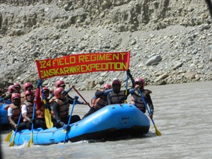 Rafters in action during White Rfting Expedition organized by Army on Tuesday.