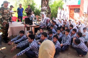 Romeo Force distributing Computer and Accessories to Govt Middle School Dheri Ralyote.