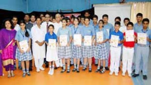 Students of KC Public School posing for a photograph alongwith MP Shamsher Singh Manhas on Wednesday.