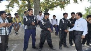 District Youth Services and Sports Officers Doda S R Kotwal interacting with players in Doda on Wednesday.