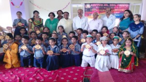 Winners of Maths Olympiad posing for a group photograph alongwith Yudhvir Sethi, Senior BJP leader at Nav Yug HSS in Jammu.