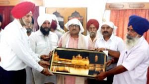 DyCM, Dr Nirmal Singh during his visit to Gurudwara Sri Kalgidhar.