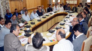 Divisional Commissioner, Dr Asgar Samoon chairing a meeting at Srinagar on Tuesday.