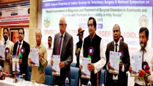 Governor N.N. Vohra releasing compendium of Annual Congress of ISVS at SKUAST.