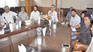DDC Anantnag Munir-ul-Islam chairing a meeting on Saturday.