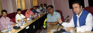 Minister for Consumer Affairs & Public Distribution Ch Zulfkar Ali chairing a meeting at Jammu on Sunday.