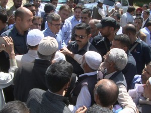 Former Chief Minister, Omar Abdullah interacting with people during his tour to Beerwah on Saturday. 