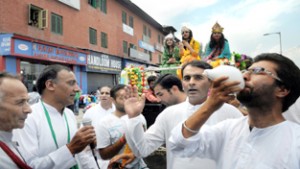 Religious procession being taken out in Srinagar on Janamashtami on Saturday. —Excelsior/Amin War