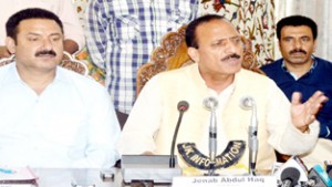 Minister for Rural Development & Panchayats, Abdul Haq addressing a press conference in Srinagar on Tuesday.  -Excelsior/Amin War