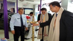 MSIL Executive Director, T Hashimoto lighting ceremonial lamp during his visit to Jamkash Vehicleades at Jammu on Tuesday.
