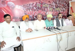 BJP leaders at a press conference at Jammu on Thursday. —Excelsior /Rakesh