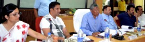 Minister for Co-operatives, Chering Dorjay chairing a meeting at Reasi on Monday.