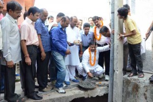 MLA Jammu West Sat Sharma kick starting development works at Subash Nagar on Sunday.