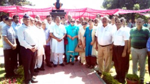 Minister of Industries & Commerce C P Ganga and others paying tributes to Lt. Sushil Khajuria at village Sangwali in Samba on Monday. -Excelsior/Gautam