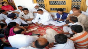 PCC chief G A Mir and other senior Cong leaders discussing problems with border firing victims in R S Pura.