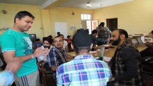 HoD Cardiology GMC Jammu Dr Sushil Sharma examining blind patients in Roop Nagar on Sunday.