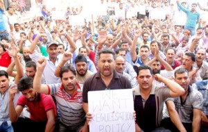 PHE workers staging protest demonstration outside Chief Engineer’s office on BC Road in Jammu on Friday.  -Excelsior/ Rakesh 