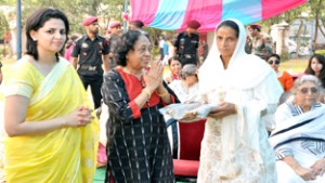 A war widow being felicitated by AWWA members during Golden Jubilee function of Battle Honour Hajipir in 16 Corps area of Jammu sector.