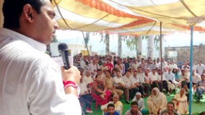 MLA, Ramnagar RS Pathania addressing a public meeting at Majalta on Tuesday. 