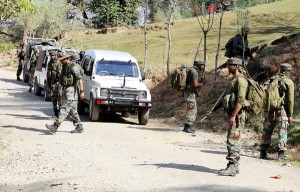 Army jawans moving towards the encounter site in Kupwara on Monday. -Excelsior/Aabid Nabi