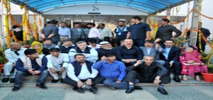 NC legislators sitting on dharna at main gate of the Assembly on Wednesday. -Excelsior/Amin War