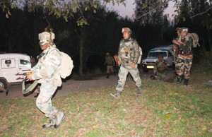 Troops during encounter with militants at Manzimpora in Shopian on Thursday.— Excelsior / Younis Khaliq