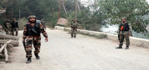 Army jawans conducting searches at Dogripora in Awantipora on Tuesday. -Excelsior/ Younis Khaliq