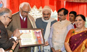 Governor N N Vohra being honoured with “Kalhan Smriti Desh Ratan Samman” at Zestha Mata temple.