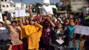Mahila Cong activists protesting against Pakistan outside UNO office at Sainik Colony in Jammu on Wednesday.