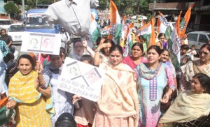 Mahila Congress activists holding protest demonstration against Modi Govt in Jammu. 
