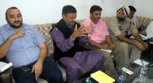 MLA Javed Ahmed Rana reviewing development works during meeting at Mendhar on Friday. 