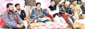 Minister for Transport Abdul Ghani Kohli addressing public grievances redressal camp at Chamalwas on Saturday.