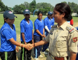 SHO city police station Inspector Shakti Sharma interacting with cricketers during JKP Women T20 cup at Gulshan Ground in Jammu.