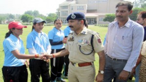 Chief guest, Mohan Lal, SSP Traffic interacting with players alongwith organizing secretary, Rajesh Gill while inaugurating JKP Women T20 Cup in Jammu on Saturday.