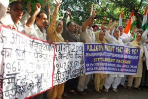 PoJK DPs staging protest demonstration at Exhibition Ground in Jammu on Thursday. —Excelsior/ Rakesh 